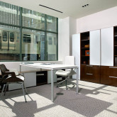 Fluent – Private Office Setting – Glass worksurface sets the stage for the energized executive