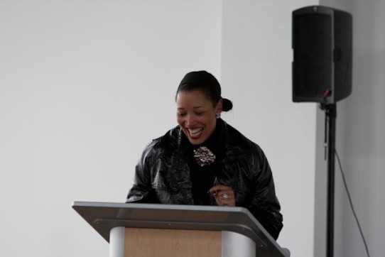 Cheryl Durst, Executive Vice President and CEO of IIDA, laughs as she gives her keynote speech on the Future of Design.