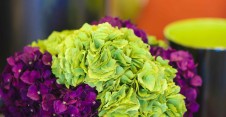 Add color quickly with accessories. This potted arrangement and urns are from The Trade Connection.