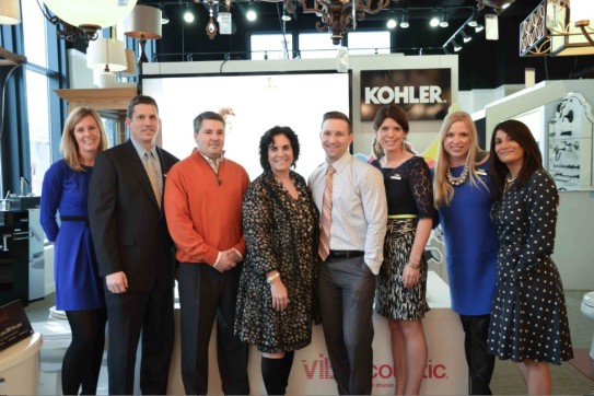 The Ferguson Bath, Kitchen & Lighting and Kohler teams gathered for a photo in the Ferguson showroom.