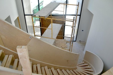 Spiral staircase begins to take shape.