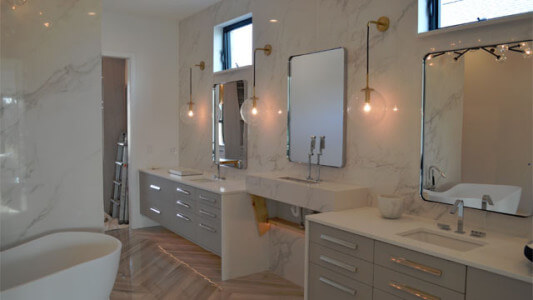 Bathroom finishes are underways with clean lines, modern fixtures and gorgeous finishes.