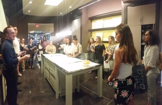 Rob Klein, owner of Conceptual Kitchens, offers a few pointers to the students.
